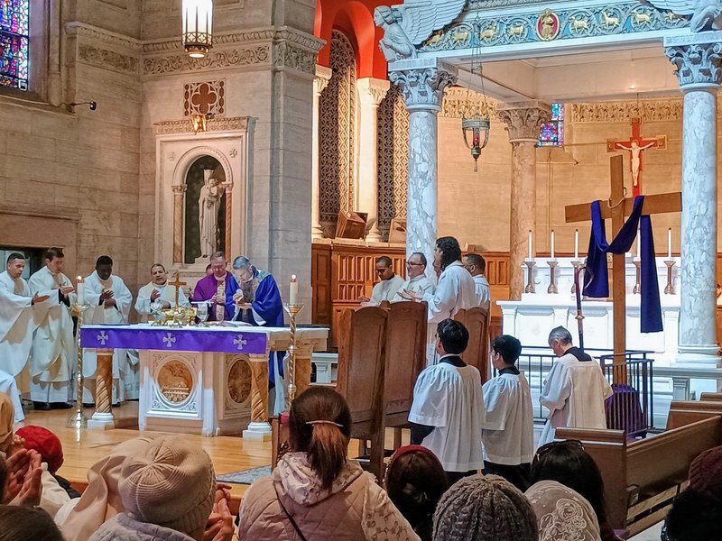 In Inwood, Archbishop Hicks Celebrates Palm Sunday Eve Mass