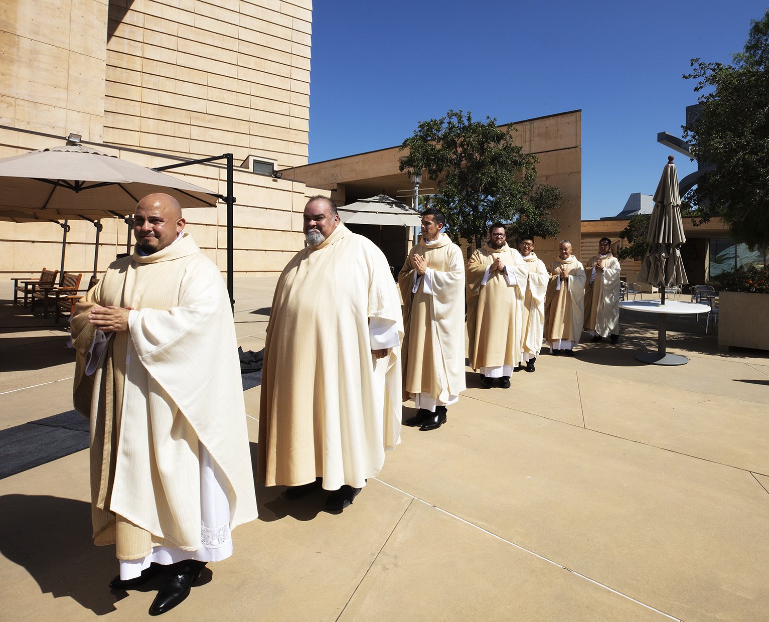 Archbishop José H. Gomez ordained eight new priests for the Archdiocese of Los Angeles on Aug. 8 in the plaza of the Cathedral of Our Lady of the Angels. (Victor Alemán)