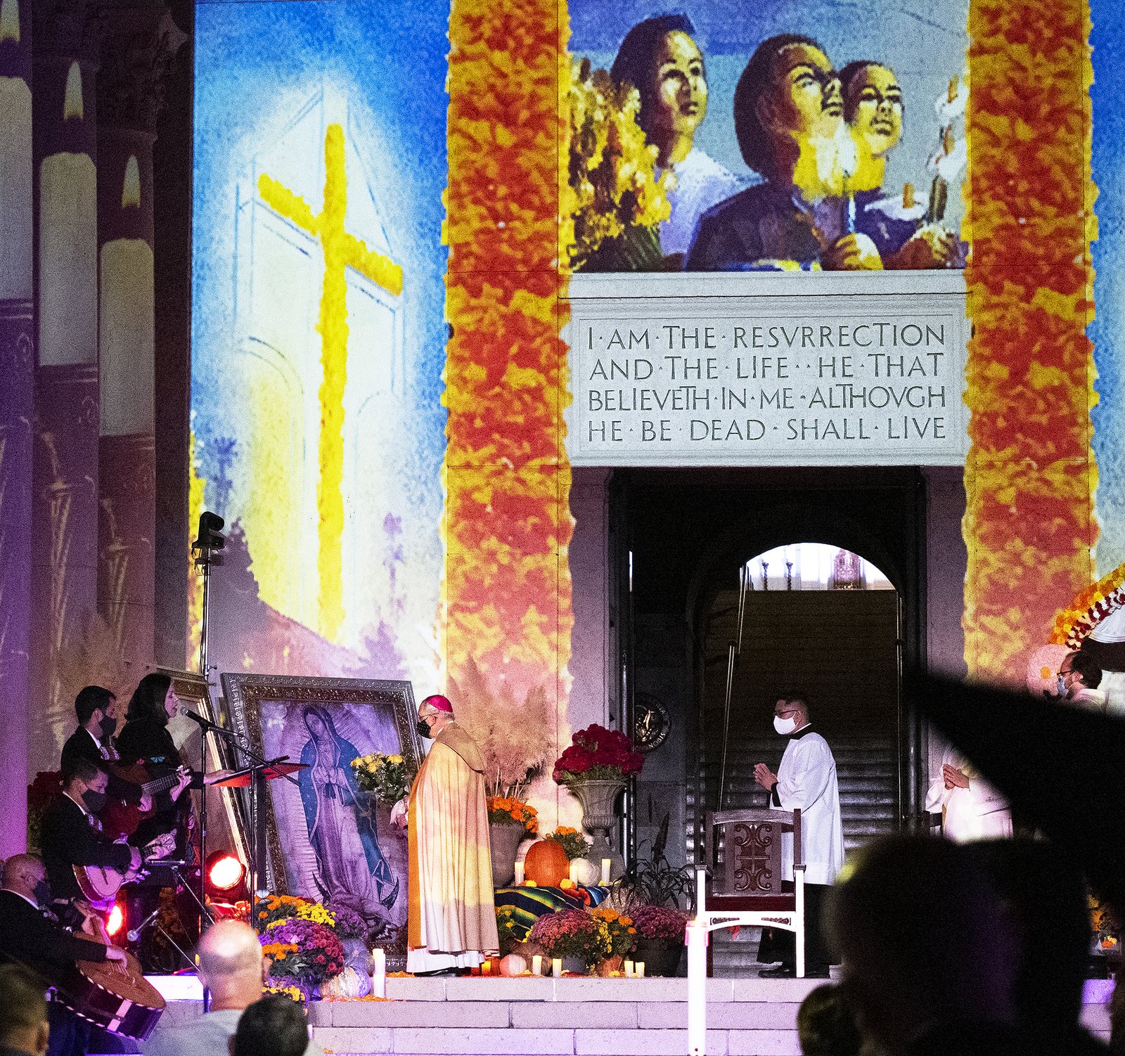 Archbishop Gomez prays before the image of Our Lady of Guadalupe at an outdoor prayer vigil for Día de los Muertos Nov. 1. (Victor Alemán)