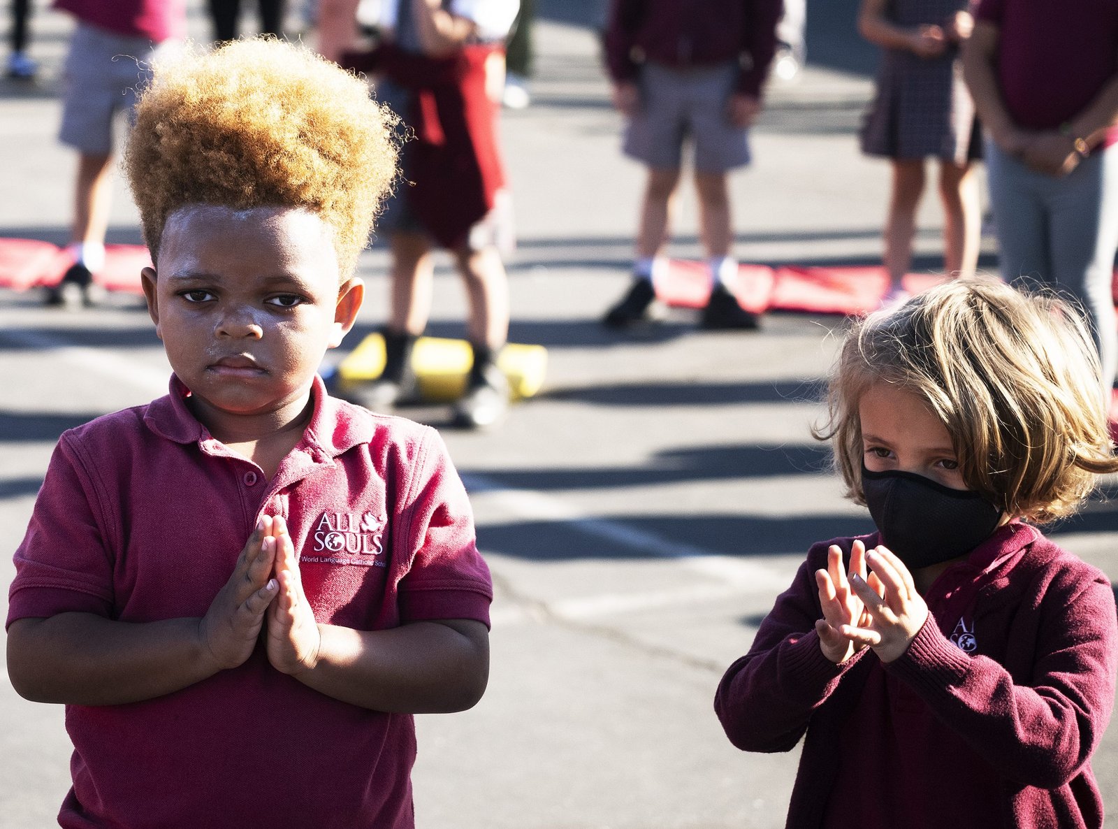 Because All Souls offers two dual-track immersion programs in Spanish and Mandarin, prayers were recited in English, Spanish, and Mandarin. (Victor Alemán)