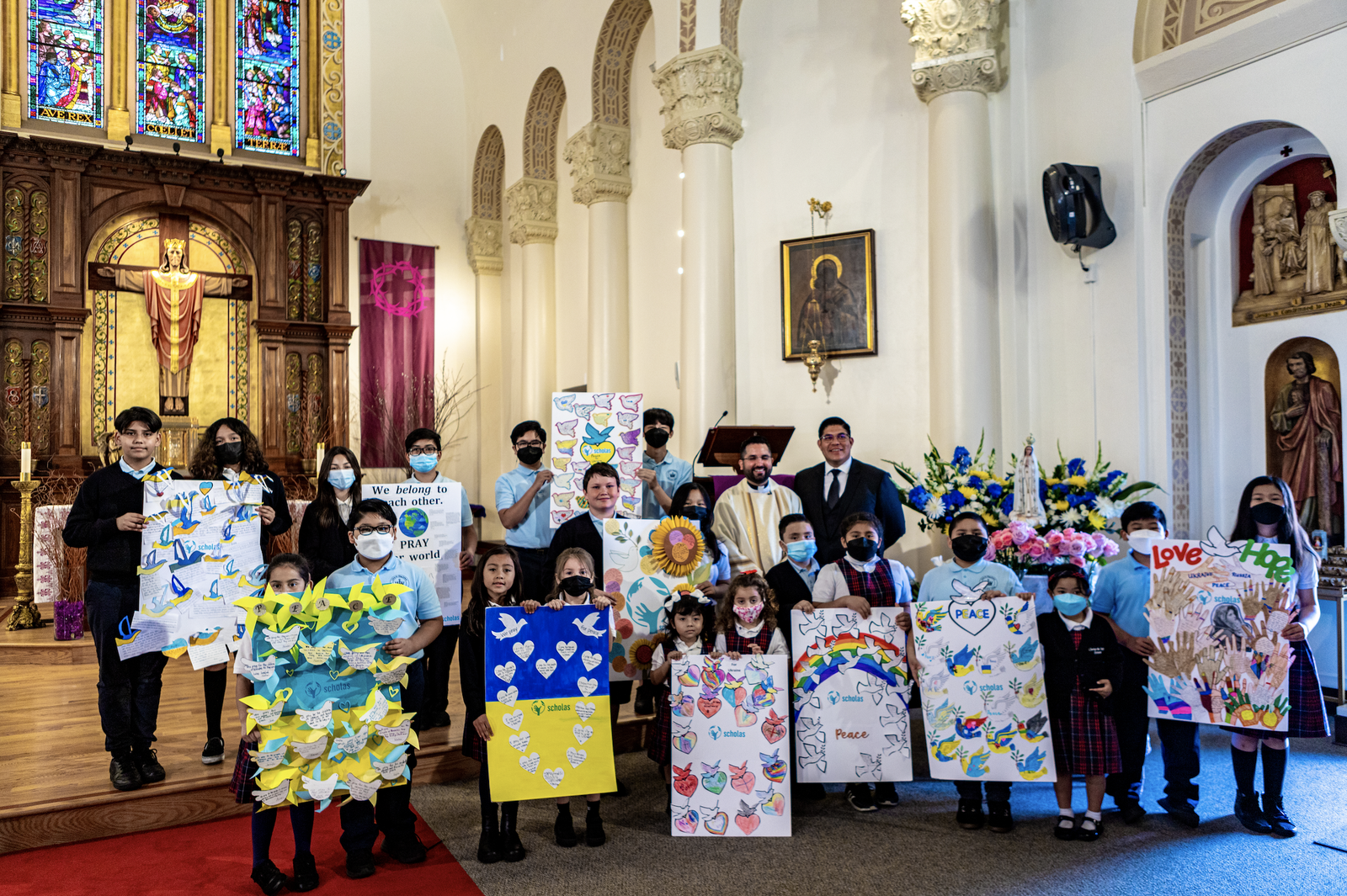 Christ the King students with their murals of prayers. (Ron Echual)