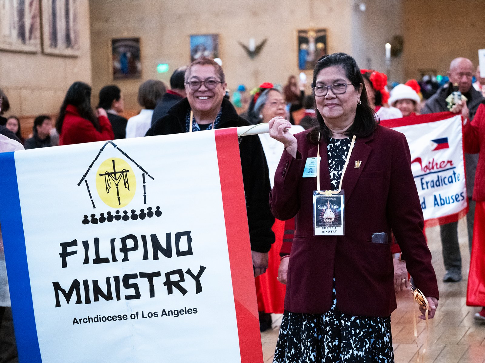 Filipino Catholics paraded into the cathedral during a procession to begin the Feast of Santo Niño Mass at the Cathedral of Our Lady of the Angels on Jan. 21. (Victor Alemán)