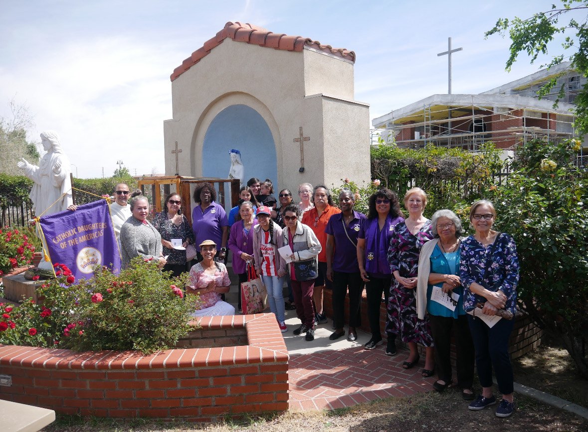 Parishioners and members of Catholic Daughters and Junior Catholic Daughters pose during a May Crowning event on May 4 at Sacred Heart Church in Lancaster. (Katie Hernandez)