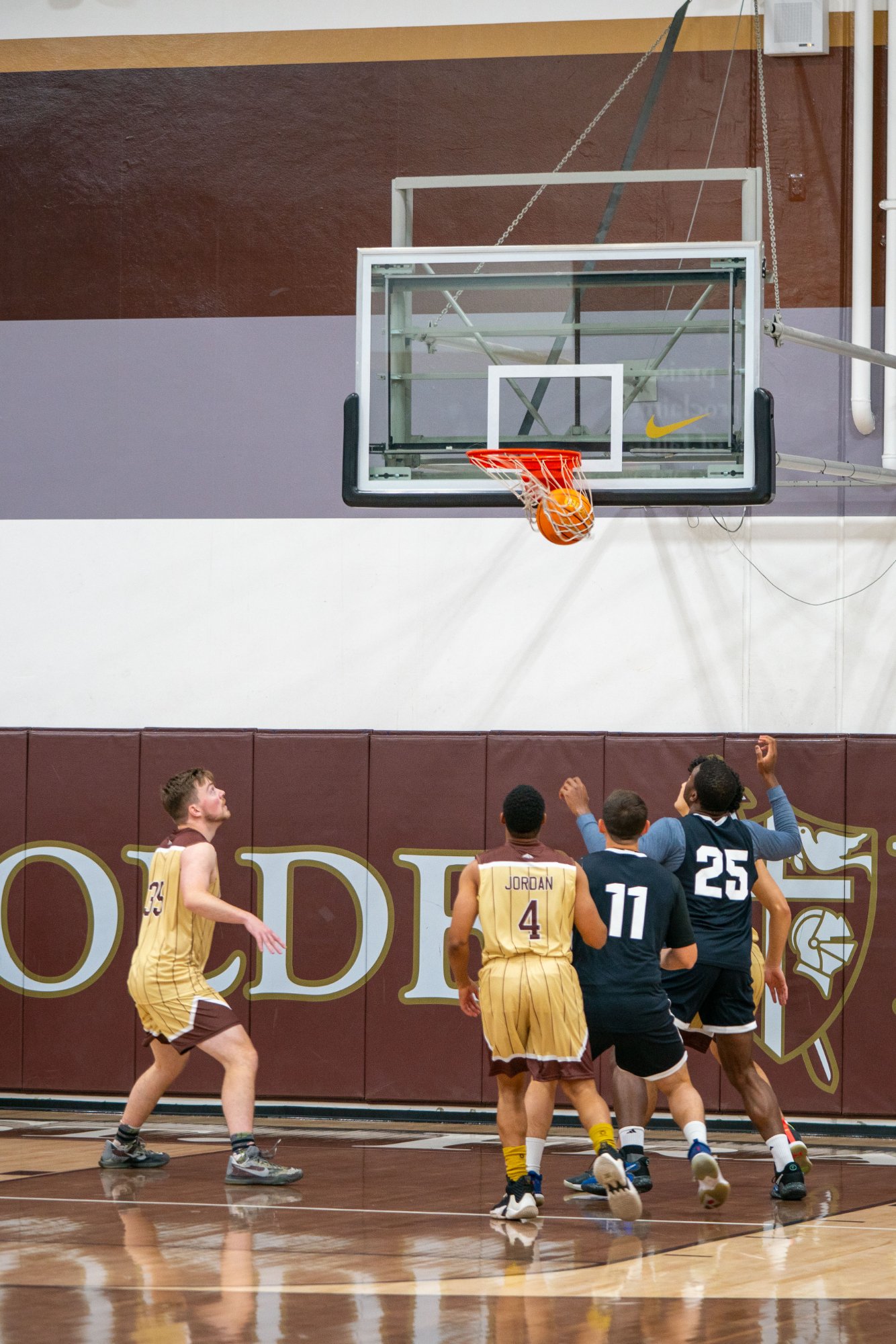 Game action as the Capuchin Franciscans play against the seminarians in the Archdiocese of Los Angeles' annual priests vs. seminarians basketball game, this year on Jan. 18 at St. Francis High School in La Cañada Flintridge. (John Rueda)
