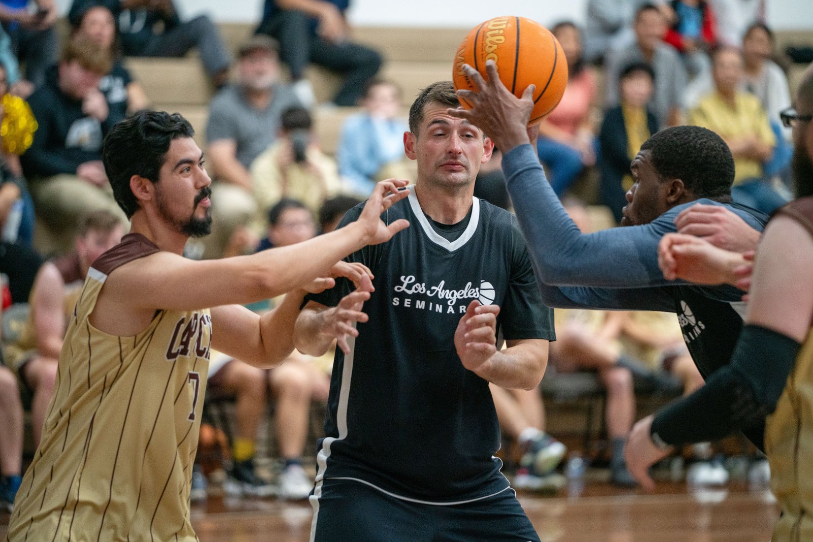 Game action as the Capuchin Franciscans play against the seminarians in the Archdiocese of Los Angeles' annual priests vs. seminarians basketball game, this year on Jan. 18 at St. Francis High School in La Cañada Flintridge. (John Rueda)
