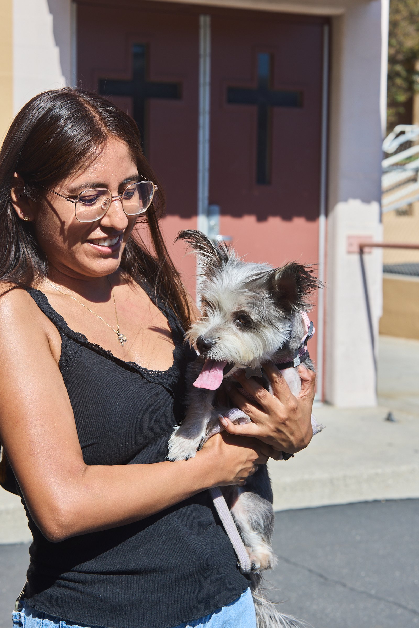 A parishioner waits to get her pet blessed during a special “Blessing of the Animals” event at at St. Francis of Assisi Church in Silver Lake on Oct. 4. (John Geronilla)