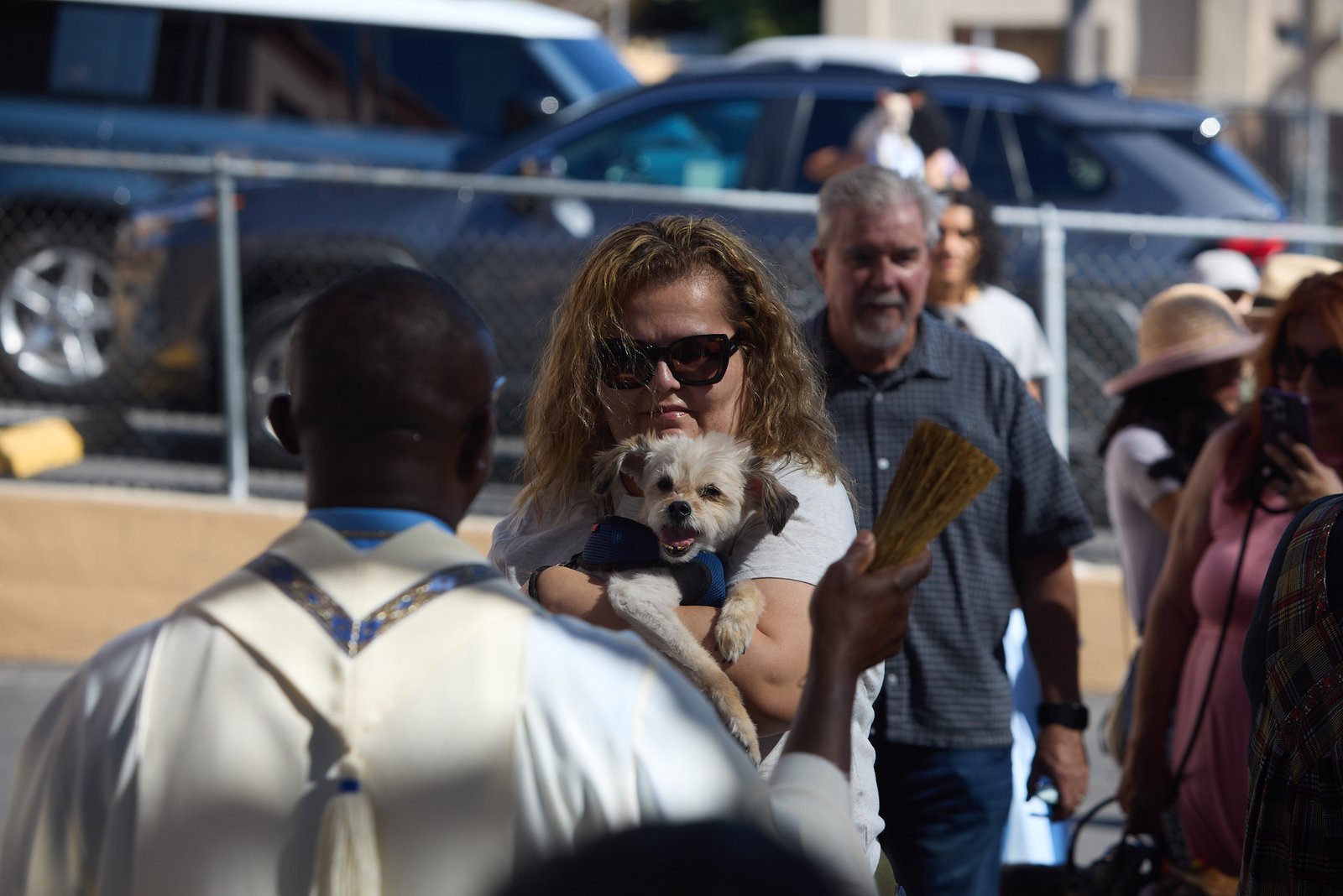 Father Chidi Ekpendu, pastor at St. Francis of Assisi Church in Silver Lake, celebrates the parish patron’s feast day with a special “Blessing of the Animals” after a special Mass and parish potluck on Oct. 4. (John Geronilla)