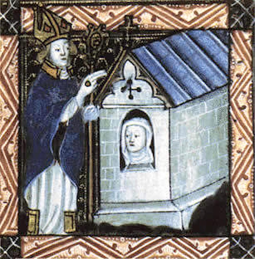 Un obispo bendice a una anacoreta. (Wikimedia Commons)