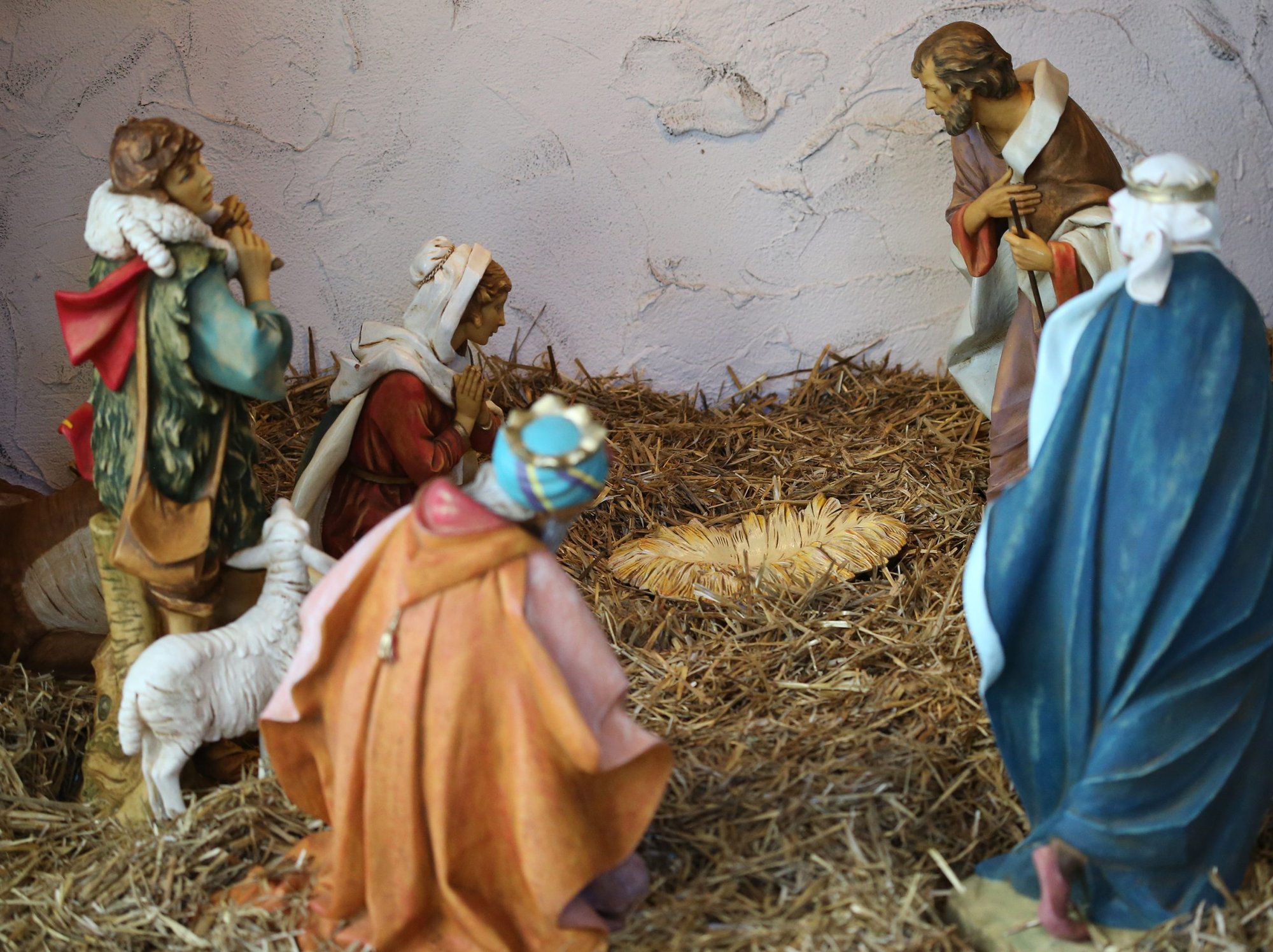 An empty crib is seen in a Nativity Dec. 19 at the headquarters of U.S. Conference of Catholic Bishops in Washington. During Pope Francis' Dec. 19 morning homily, he asked people to pray before the empty Christmas crib during the last days of Advent and say, "Come Lord, fill the crib, fill my heart and encourage me to give life, to be fruitful." (CNS photo/Bob Roller)