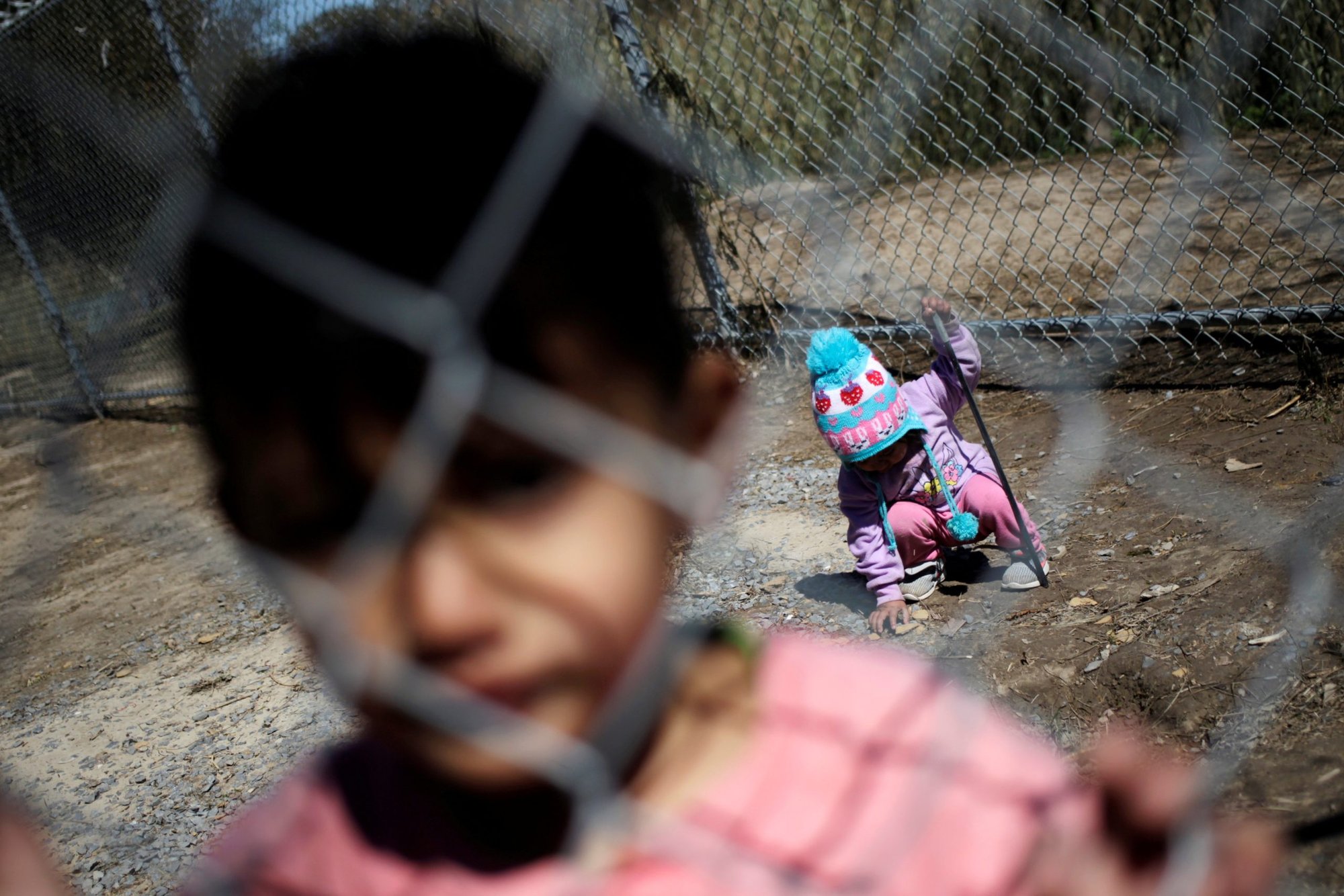 Niños migrantes que buscan asilo en Estados Unidos fotografiados en un campamento de migrantes en Matamoros, México, el 19 de febrero de 2021. (CNS photo/Daniel Becerril, Reuters)