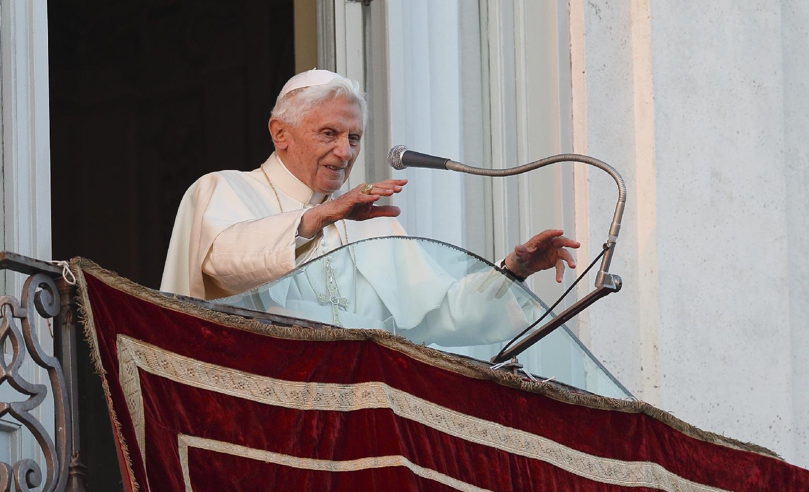 Pope Benedict XVI greets the crowd in 2013, in his last papal appearance. (CNS/Paul Haring)