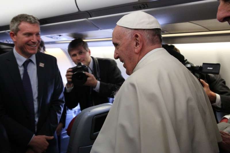 Pope Francis and Matteo Bruni aboard the papal flight to Cuba Feb. 12
