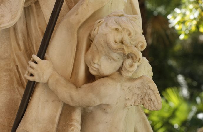 A statue of an angel is seen in the Teutonic cemetery at the Vatican March 6