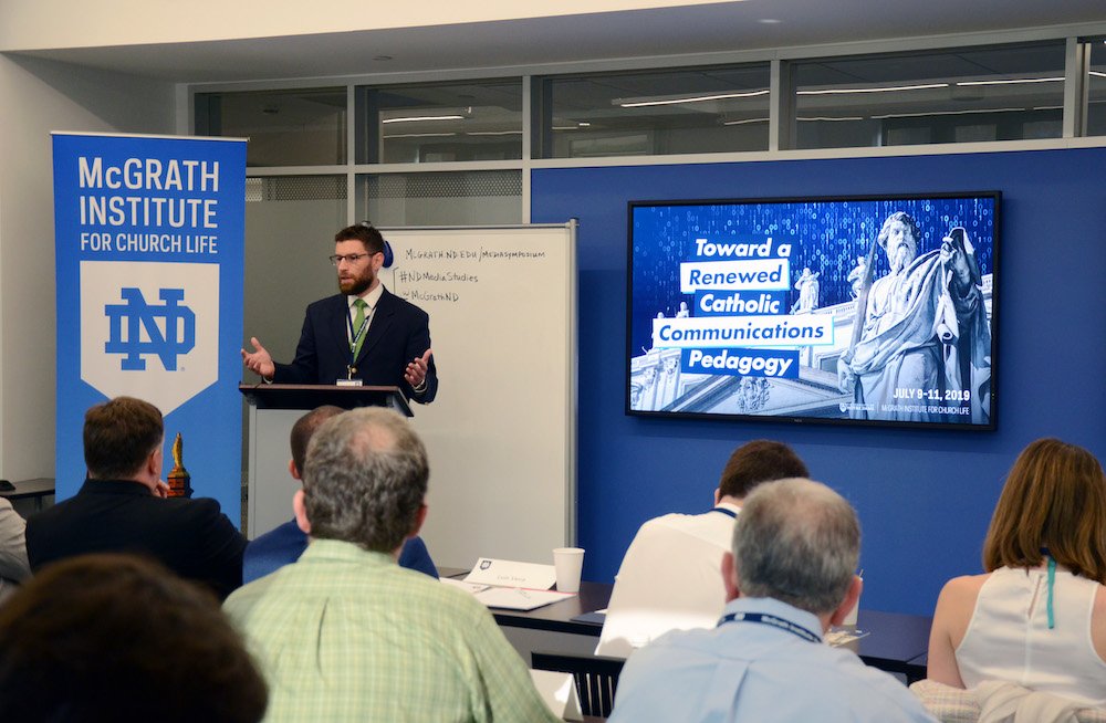Brett Robinson speaks at a symposium hosted by the McGrath Institute for Church Life at the University of Notre Dame in South Bend
