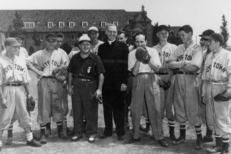 Father Edward Flanagan with baseball players at Boys Town. Photo courtesy of the Father Flanagan League.