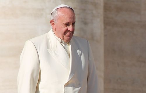 Pope Francis greets pilgrims in St. Peter's Square during the Wednesday general audience on Dec. 4