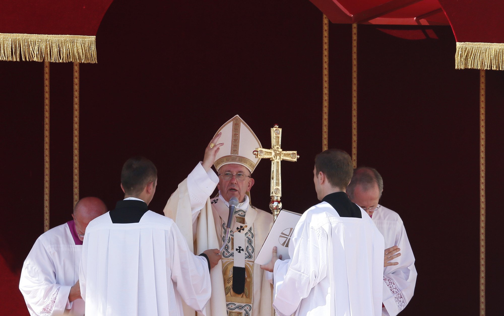 Pope Francis delivers his blessing at the conclusion of the canonization Mass of St. Teresa of Kolkata in St. Peter's Square at the Vatican Sept. 4. (CNS photo/Paul Haring)