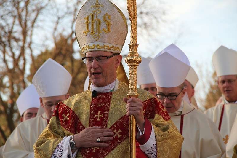 Bishop James D. Conley prays at installation Mass outside of Risen Christ Cathedral in Lincoln