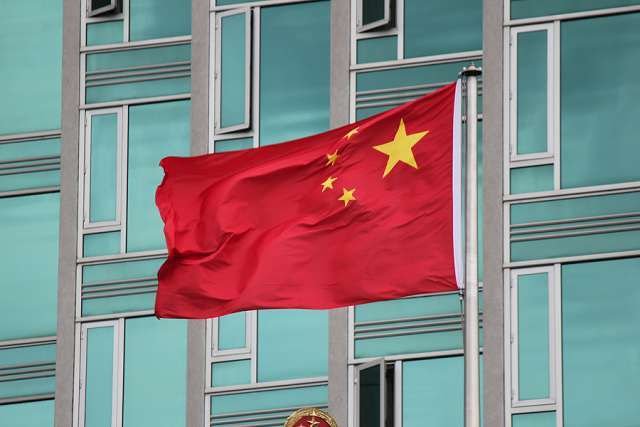 Flag of China. Credit: Tomas Roggero via Flickr CC BY 20 12 10 15.