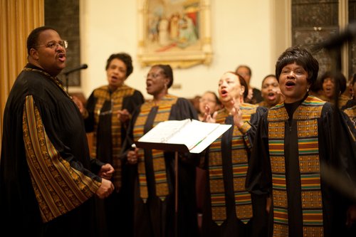 Archdiocese of Boston Black Catholic Choir Director Meyer J. Chambers and member Joyce Durst (foreground) perform at St. Peter's Catholic Church in Worcester. (SHUTTERSTOCK)
