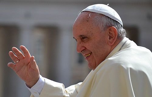 Pope Francis greets pilgrims in St. Peter's Square during the Wednesday general audience on May 28