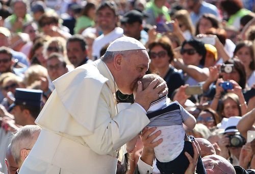 Pope Francis greets pilgrims in St. Peter's Square during the Wed. general audience on Sept. 3
