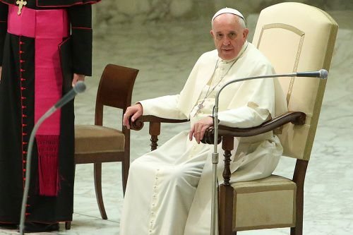 Pope Francis delivers an addresss at the Vatican's Paul VI Hall