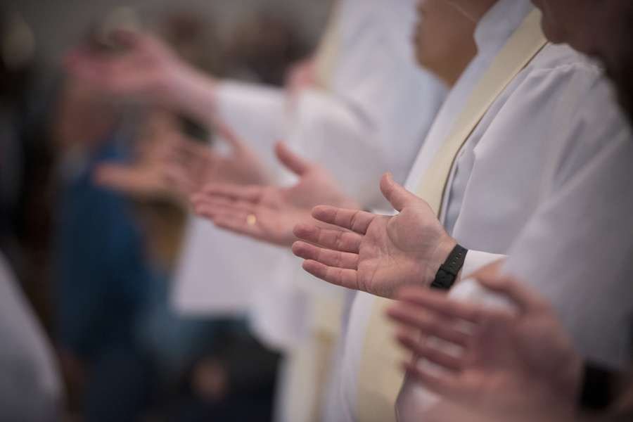 Priests celebrate Mass at the Cathedral of the Immaculate Conception in Denver