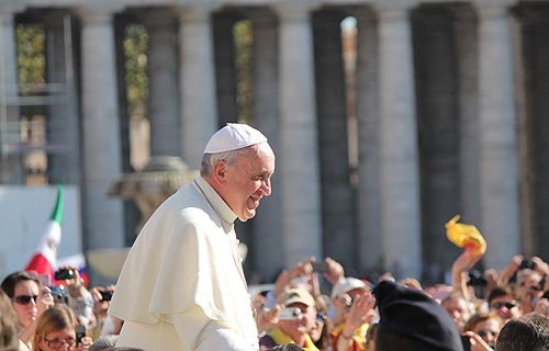 Pope Francis greets pilgrims in St. Peter's Square before the Wednesday general audience on October 2