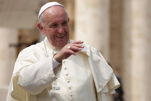 Pope Francis waves to the crowds at the general audience in St. Peter's Square on Sept 2