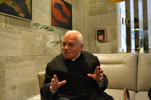 Father Gjergj Simoni speaks with CNA in Tirana