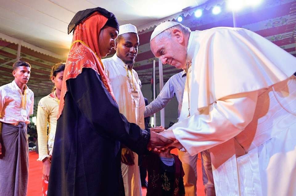 Pope Francis greets members of the Rohingya Muslim community in Dhaka