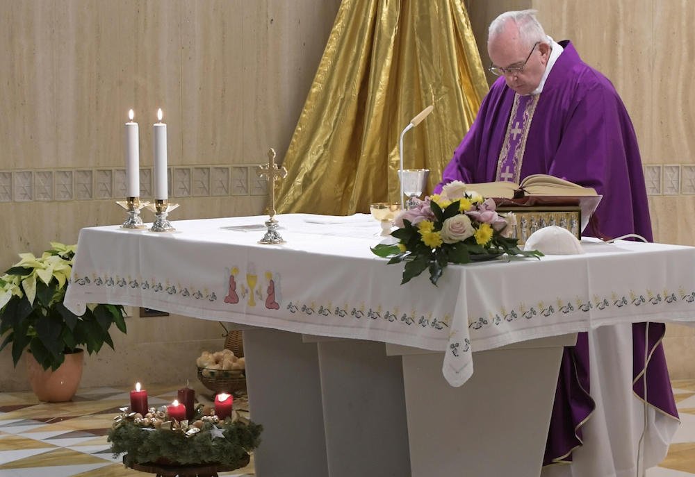 Pope Francis celebrates Mass Dec. 18 in the chapel of the Domus Sanctae Marthae