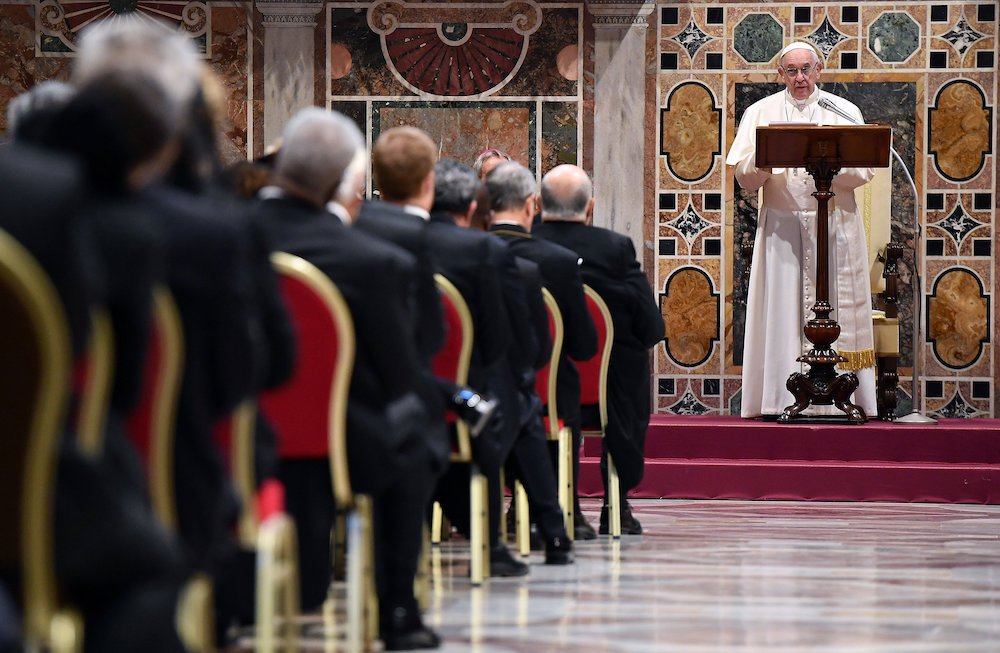 Pope Francis leads an annual meeting to exchange greetings for the new year with diplomats accredited to the Holy See