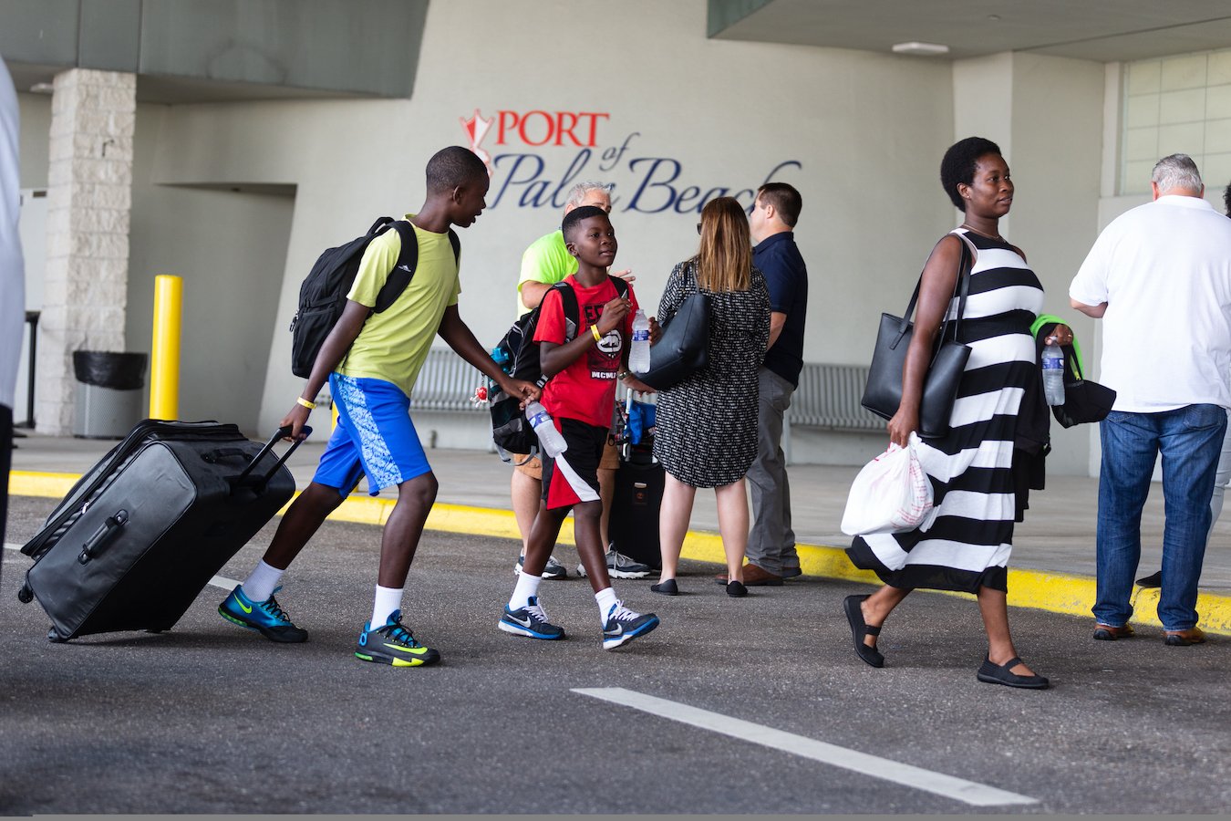 People arrive from the Bahamas Sept. 18, 2019, at the Port of Palm Beach, Fla. More than 200 visa-carrying Bahamas evacuees arrived at the port following Hurricane Dorian, which slammed into the islands with historic devastation Sept. 1-3. (CNS photo/Tom Tracy)