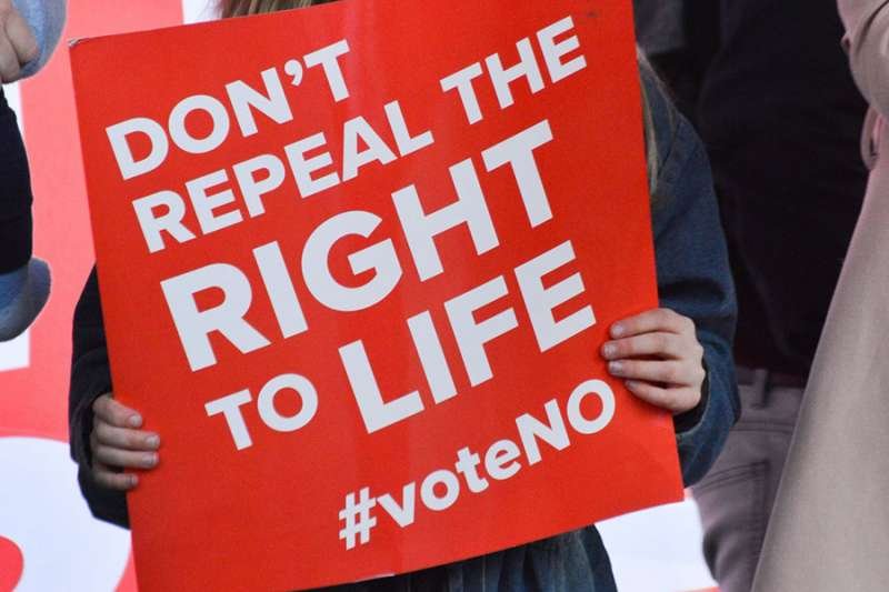 Sign from the "Save 8 Rally
