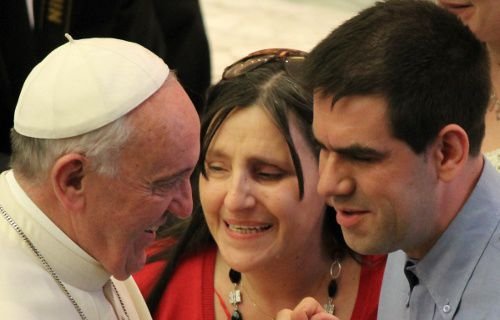 Pope Francis greets attendees at an audience for the deaf and blind March 29. Credit: Lauren Cater / CNA.