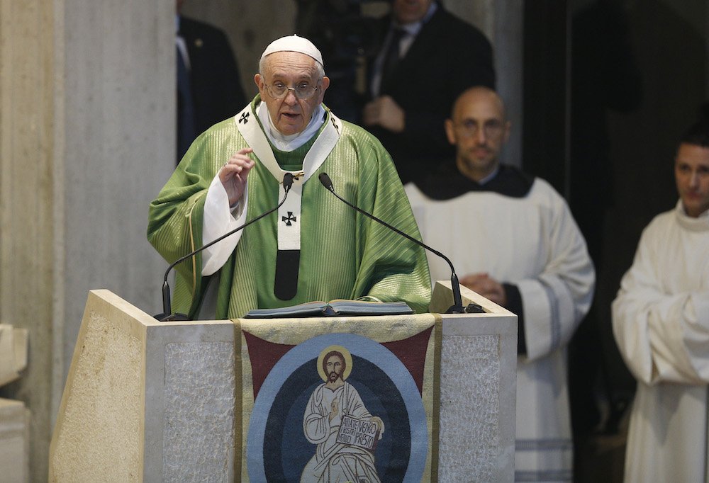 Pope Francis gives the homily as he celebrates Mass at the Parish of St. Crispin in a suburb on the outskirts of Rome March 3