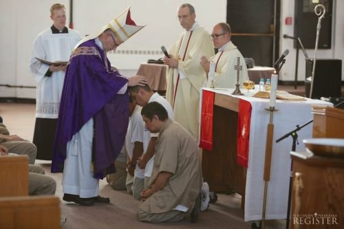 Bishop James Conley confirms men at the Nebraska State Penitentiary March 31. Credit: Southern Nebraska Register.