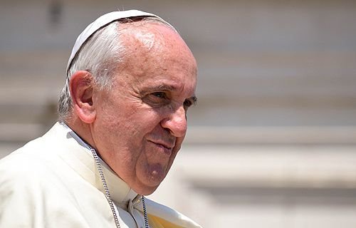 Pope Francis greets pilgrims in St. Peter's Square during the Wednesday General Audience