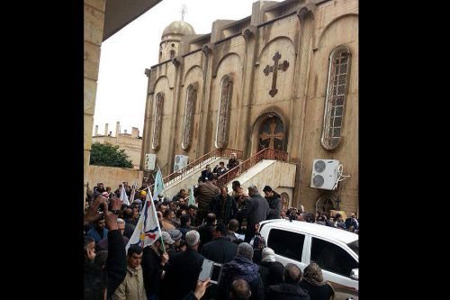 Displaced Assyrian families in the Assyrian cathedral of Al-Hasakah