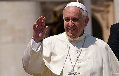 Pope Francis greets pilgrims in St. Peter's Square during the Wednesday General Audience
