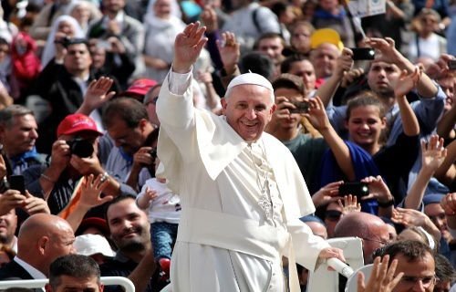 Pope Francis greets pilgrims in St. Peter's Square on Oct. 13
