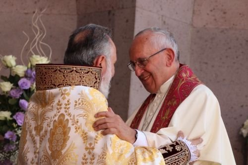 Pope Francis greets Catholicos Karekin II during divine liturgy