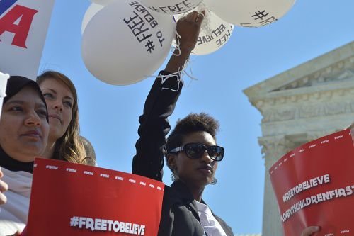 Supporters of marriage join protests in front of the U.S. Supreme Court during oral arguments in Obergefell v. Hodges