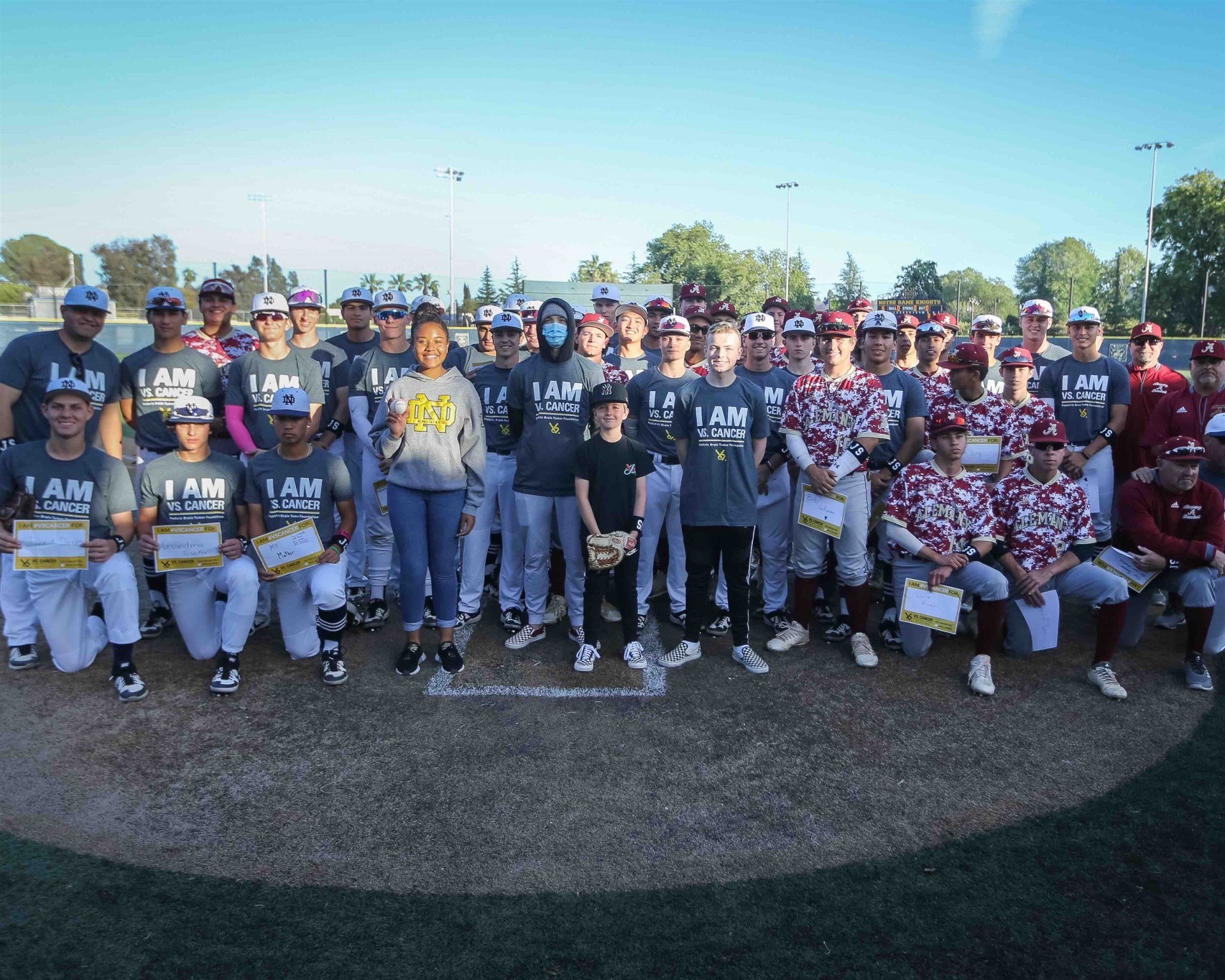 Notre Dame Sherman Oaks' baseball team is pictured after an event April 12 in which they paired up with Vs. Cancer to help support the Stromsborg family while they undergo treatment for their son Jake