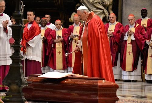 Pope Francis administers last rites to Cardinal Simon Lourdusamy during his funeral Mass on June 5