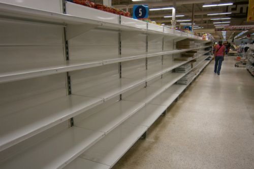 Empty shelves in a Venezuelan market