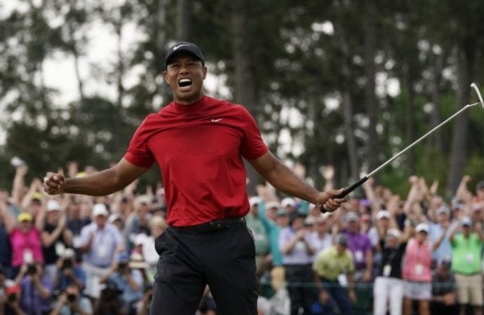 Tiger Woods reacts as he wins the Masters Golf Tournament on Sunday
