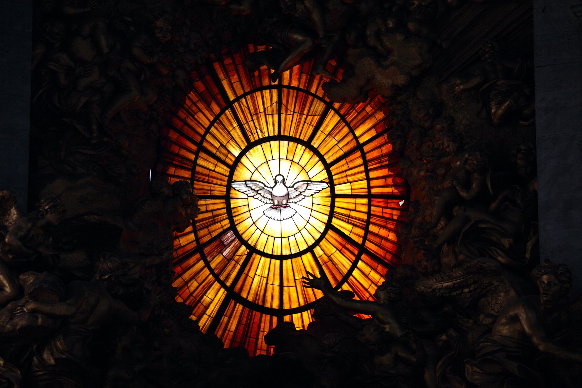 Stained glass behind the altar at St. Peter’s Basilica in the Vatican. (shutterstock.com)